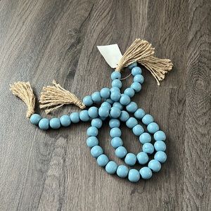 Blue wooden decor beads with tassels